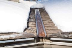 EDGE-CUTTER channel flashings de-icing roof in Winter