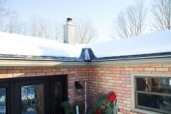 EDGE-CUTTER channel flashings de-icing roof in Winter
