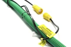 Tandem-Link yellow plug and plug-in on green pipe